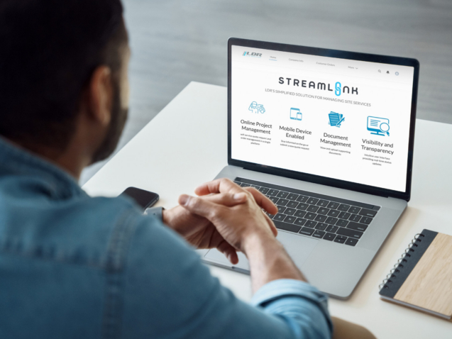 Business professional viewing LDR’s Streamlink online ordering portal on a laptop during a training webinar.