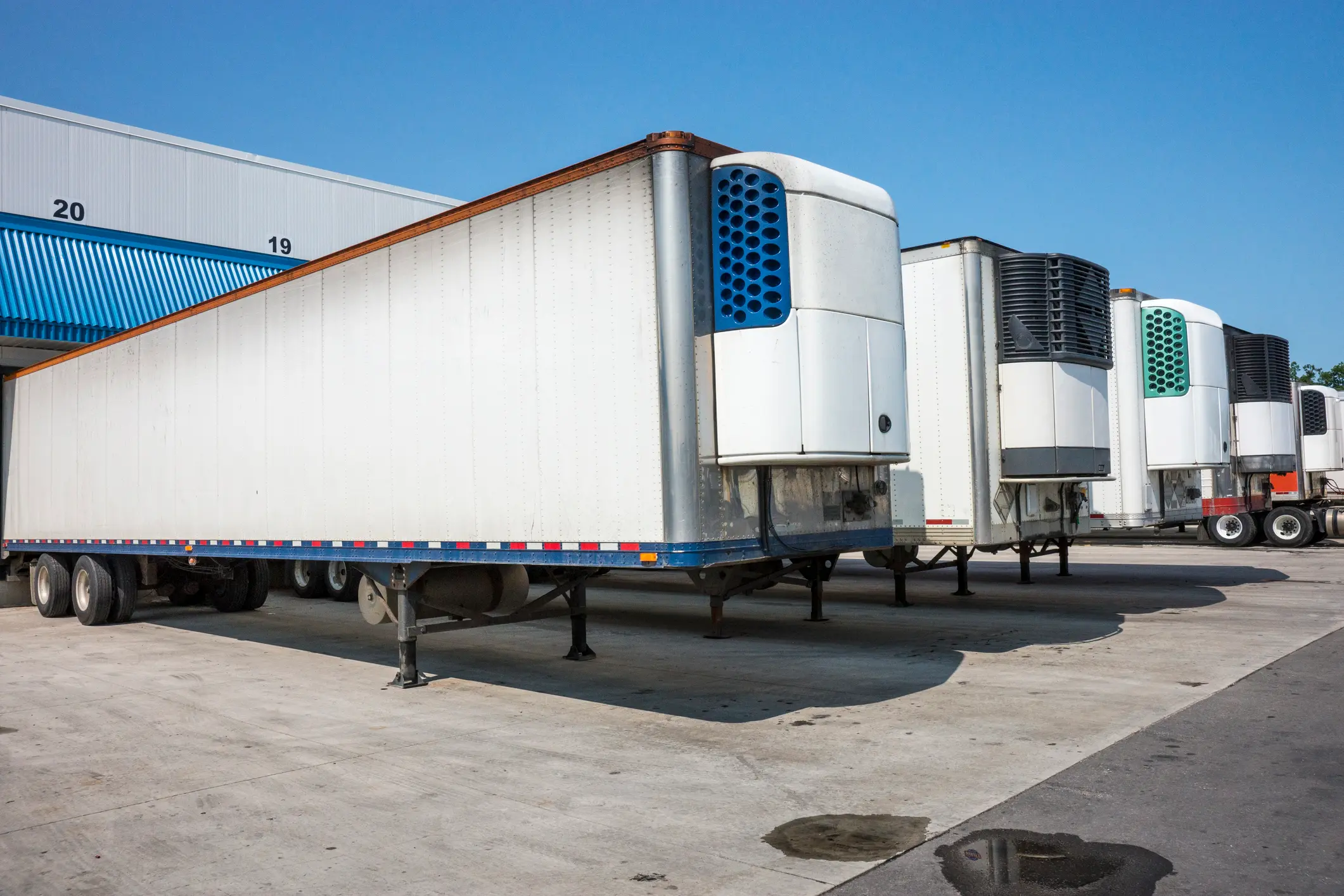 Refrigerated trailers parked at distribution center during LDR Site Services recovery operations.