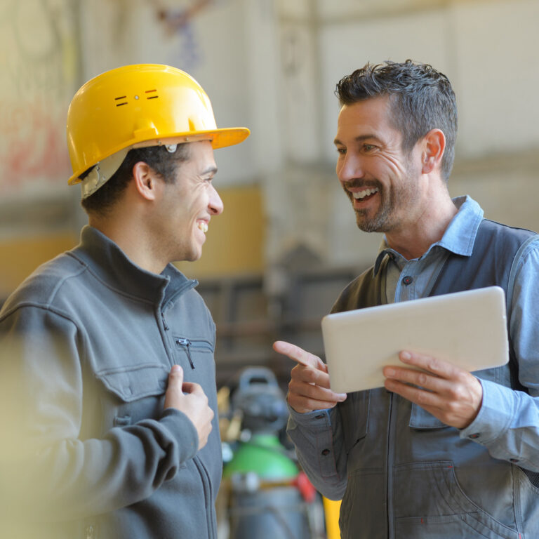 Men enjoying time at a work site.