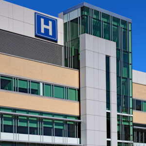Modern style building with large H sign for hospital
