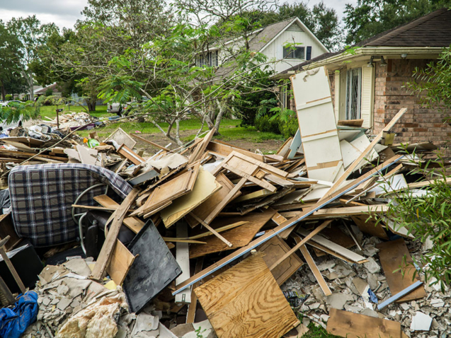 Trash and debris outside of neighborhoods devastated by Hurricane Harvey