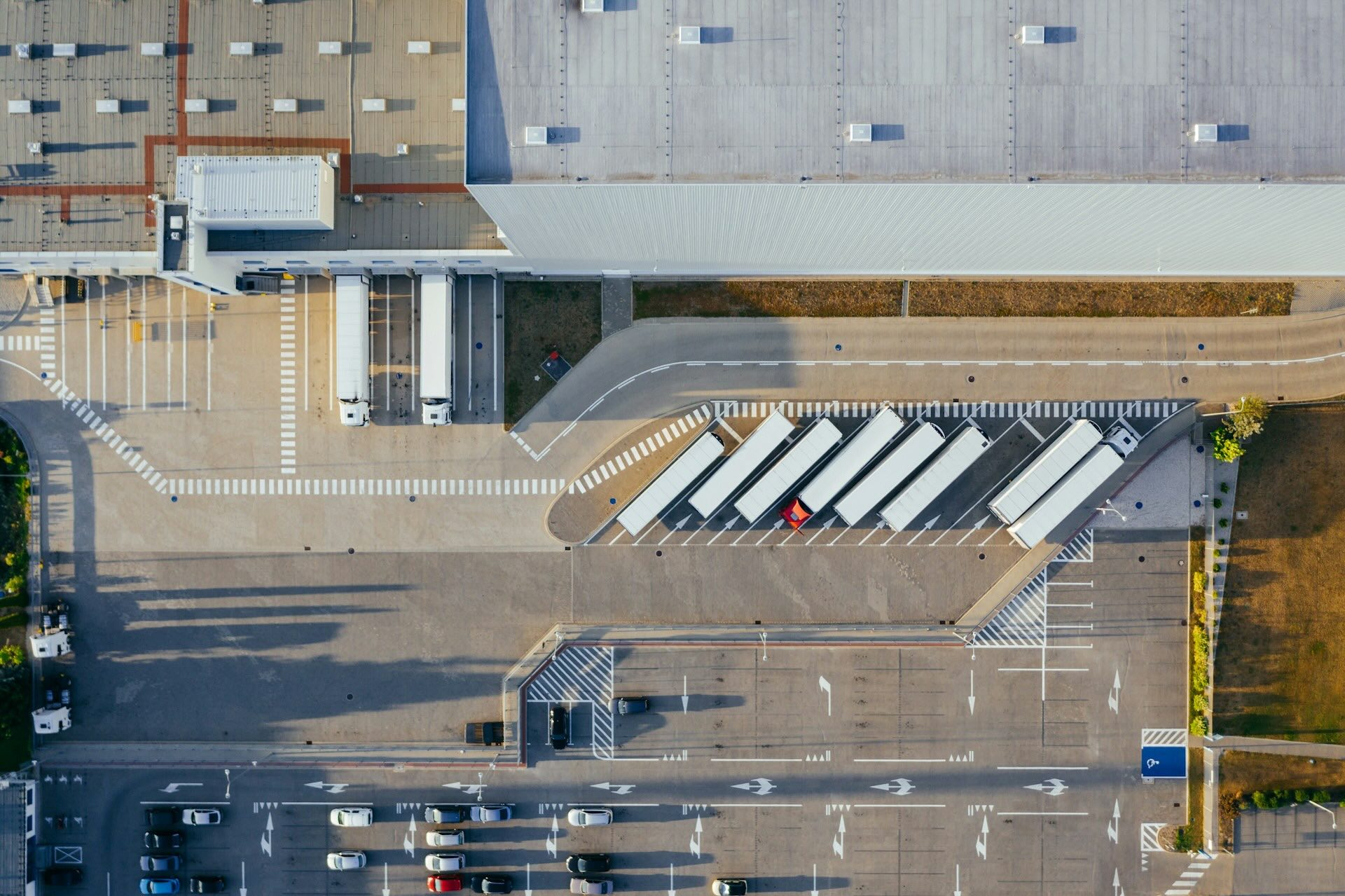 Aerial view of a distribution center and retail footprint with loading bays